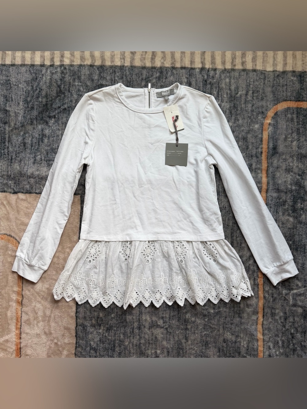 Marled White Long-Sleeve Eyelet Peplum Tunic